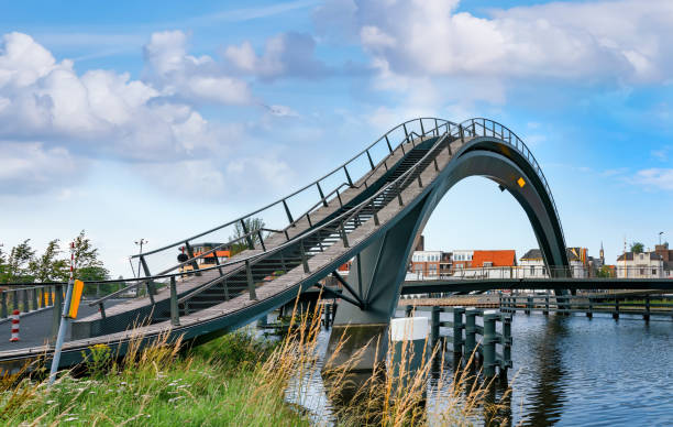 Iconic bridge for cycling and walking in Purmerend; Melkwegbrug stock photo