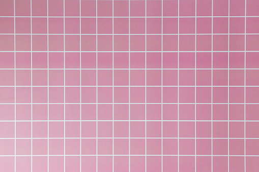 Pattern of Pink grid on the wall texture background