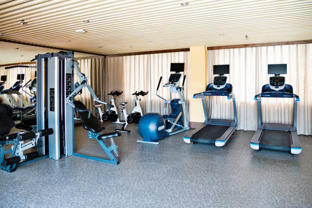 istock Group of exercise machines in gym room 1177565158