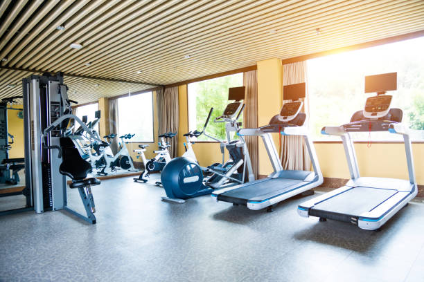 istock Group of exercise machines in gym room 1177565168