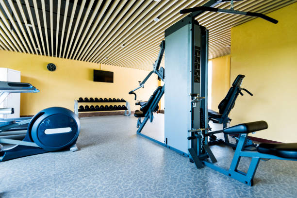 istock Group of exercise machines in gym room 1177565179