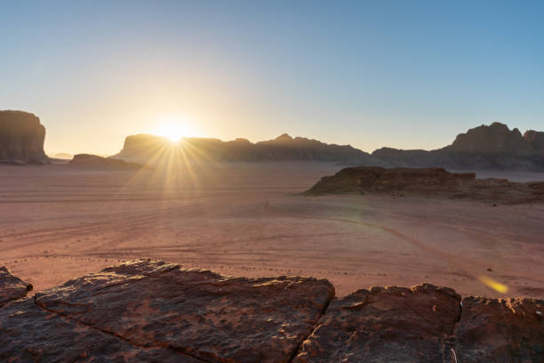 istock Wadi Rum desert landscape in Jordan, with sunset and clear sky 1177567741