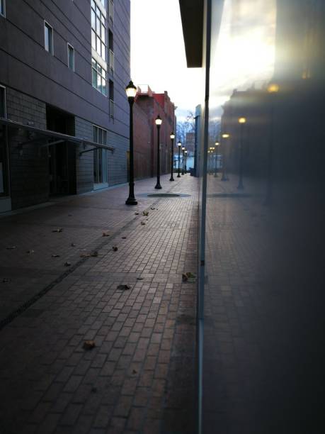 istock ARIMG1701_Alley with street light, Reflected with sun on marble side 1177573998