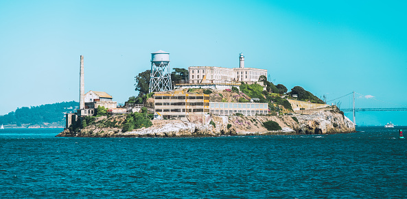 The prison island of Alcatraz seen outside the coast of San Francisco, California, USA.