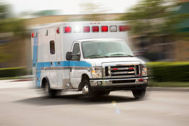 Ambulance An ambulance responds to the scene of an emergency. ambulance photos stock pictures, royalty-free photos & images
