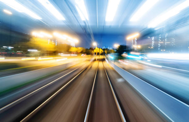 Motion blur railroad track in the city at night.