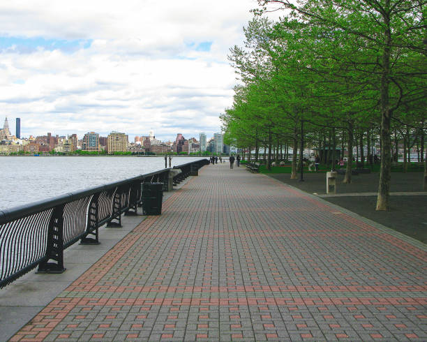 istock A River Walkway By the Hudson River Between Hoboken NJ and Manhattan 1177587893