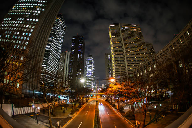 The road passing through the high-rise buildings. Shooting Location: Tokyo metropolitan area