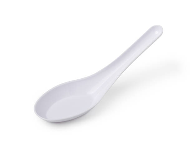 istock White plastic spoon isolated on white background, with clipping path. 1177589591