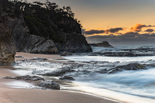istock Rocky Beach and Sunrise Seascape 1177598634