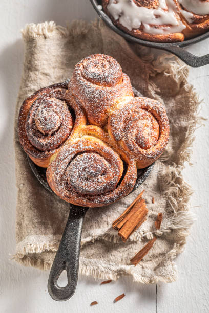 istock Traditionally cinnamon buns with spices, cocoa and sugar 1177603741