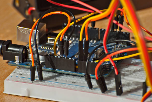 istock Electronics and robotics of handmade. Microcircuits and colored wires close up. Electronic devices and mechanisms are presented at the scientific exhibition. 1177605503