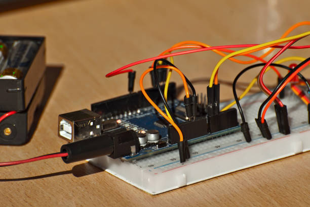 istock Electronics and robotics of handmade. Microcircuits and colored wires close up. Electronic devices and mechanisms are presented at the scientific exhibition. 1177605626