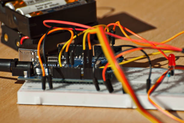 istock Electronics and robotics of handmade. Microcircuits and colored wires close up. Electronic devices and mechanisms are presented at the scientific exhibition. 1177605665
