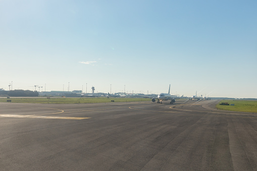 Several aircraft on runway in Fiumicino International Airport \