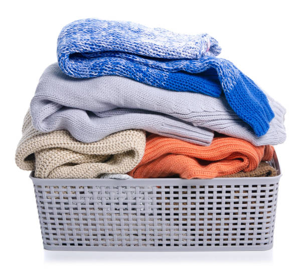 istock Basket with laundry clothing, sweaters 1177610833