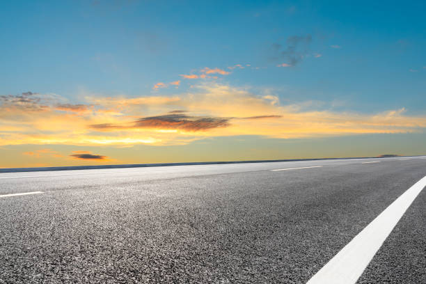 istock Empty asphalt highway and beautiful sunset clouds 1177614555