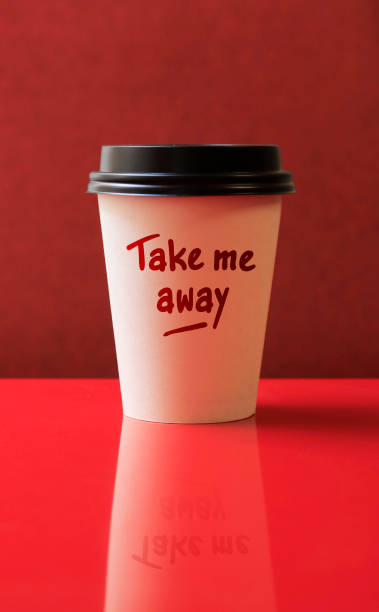 istock Take me away writes on paper coffee cup. 1177615675