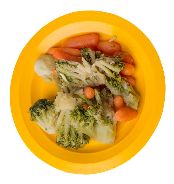 istock provencal vegetables on a plate.grilled vegetables on a plate isolated on white background.broccoli and carrots on a plate top view.healthy  food 1177617807