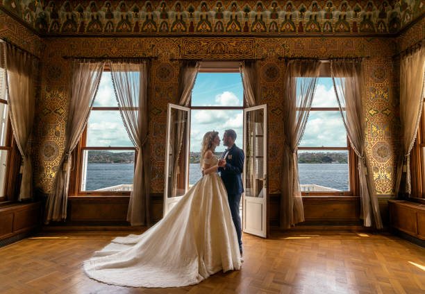 wedding ceremony dancing in the palace - istanbul seascape in the topkapi palace - luxury glamour dress caucasian imagens e fotografias de stock