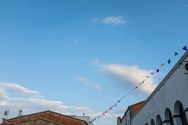 istock Colourful party flags on an outdoor scene under a blue sky 1177619683
