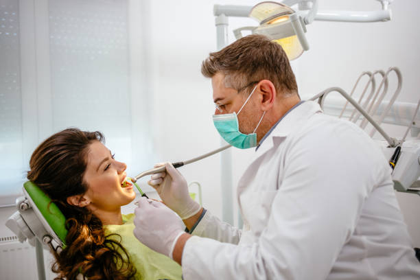 istock Young woman at dentist's office replacing fillings 1177621244