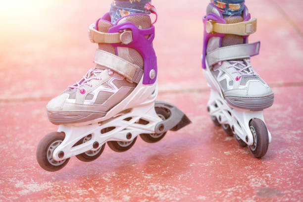 Close up on roller skate shoes. Concept of youth, and sport lifestyle. Close up on roller skate shoes. Concept of youth, and sport lifestyle. skater feet stock pictures, royalty-free photos & images