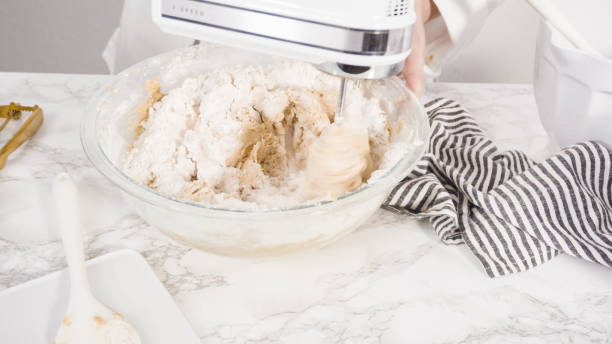 istock Mixing ingredients in a glass bowl 1177622687