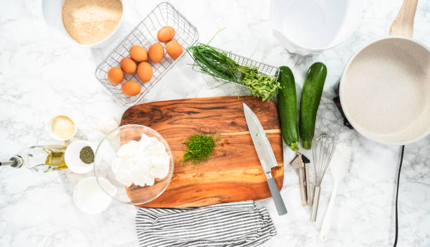 istock Cutting fresh dill on a wood cutting board 1177622877