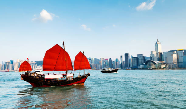istock Junk boat crossing Hong Kong harbor 1177626734