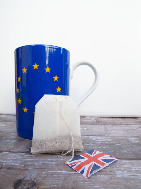 istock Cup and tea bag, featuring European and British flag 1177628080