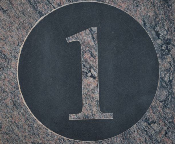 Number 1 in pink marble within a  black circle