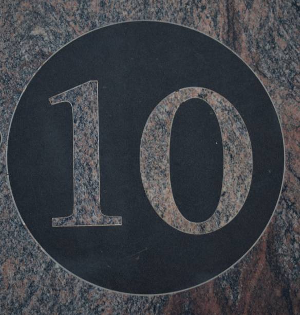 istock 10, Pink marble number within a black circle 1177629465