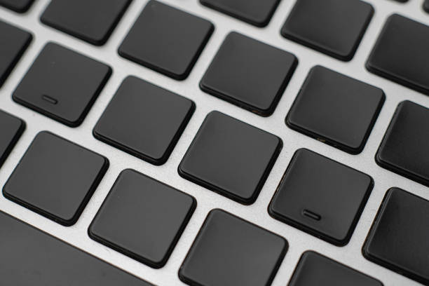 istock macro shot of empty blank keys on a keyboard without letters 1177630354