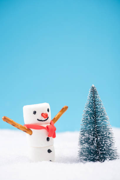 istock Happy Funny Snowman Play in Snow by Christmas Tree 1177630426