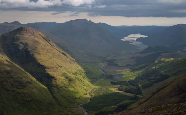 Landscape in the Highlands of Scotland. View of Glen Etive from the Buachaille Etive Beag, in Glencoe View of the valley of Glen Etive from the Stob Dubh peak, summit of the Buachaille Etive Beag, with Loch Etive in the background. Highlands of Scotland. Munro bagging. Hiking. Hill Walking buachaille etive beag photos stock pictures, royalty-free photos & images