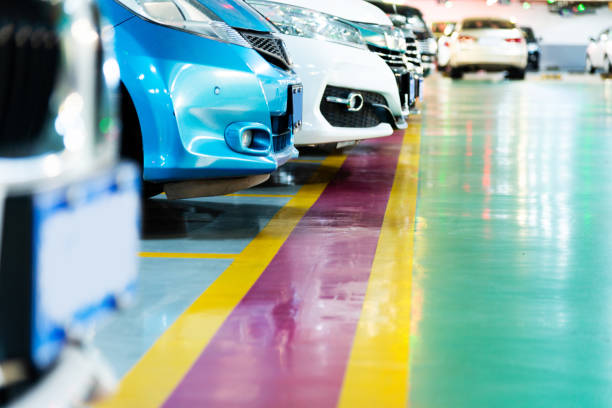 istock Cars in parking garage background 1177634696