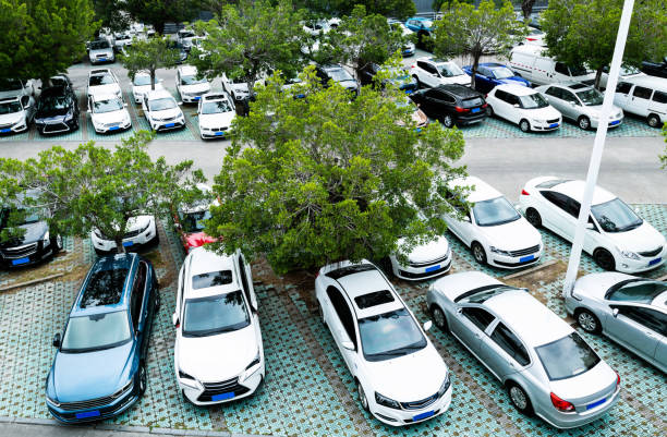 istock Cars in parking garage background 1177635658