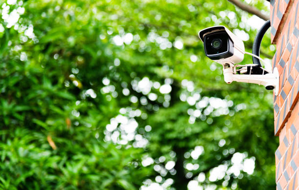 istock Security camera on the wall of residential building 1177637780