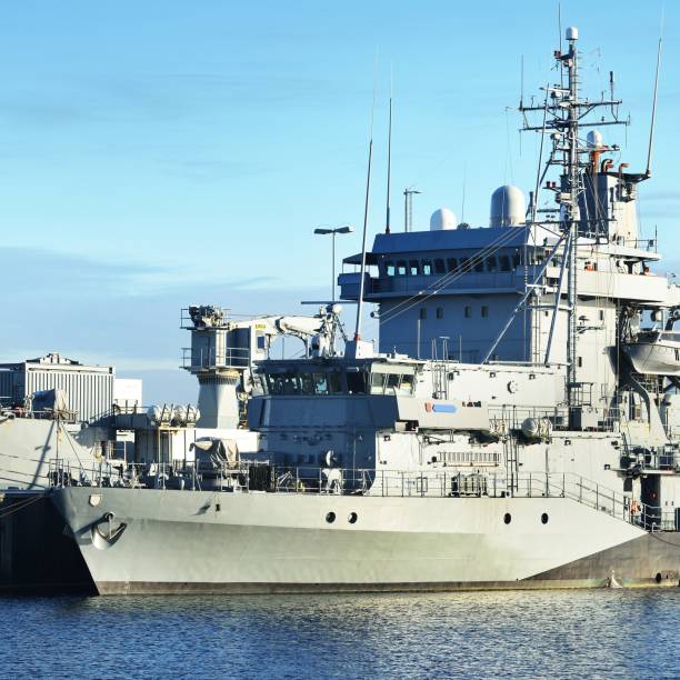 istock Moored military ships on a pier in Kiel 1177640444