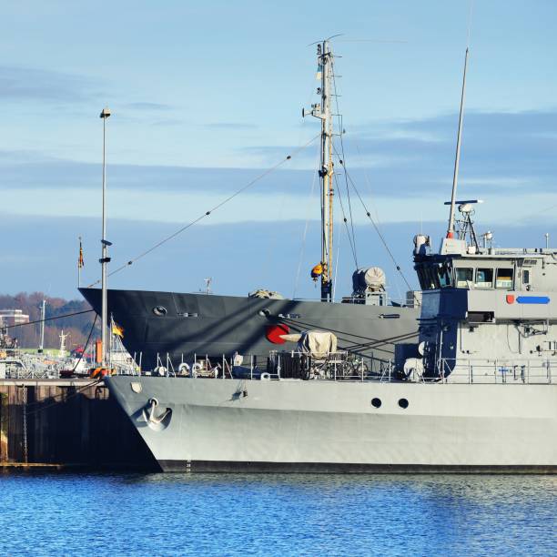 istock Moored military ships on a pier in Kiel 1177640468