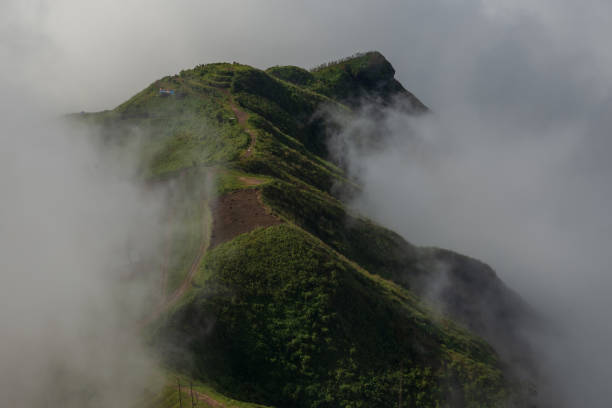 istock Misty clouds cover mountains in Thailand. 1177642256