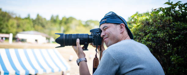 Men taking photo at athletic meet