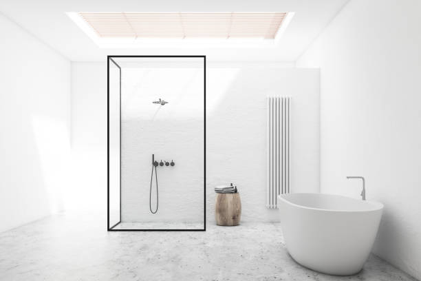 istock White bathroom interior with shower and tub 1177649588