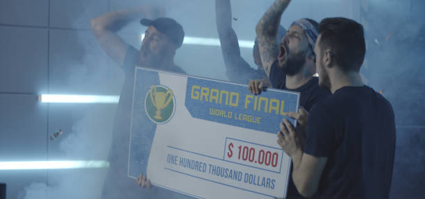 istock Gaming tournament team celebrating their victory 1177651678
