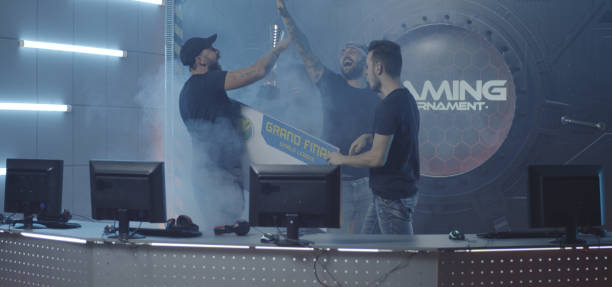 istock Gaming tournament team celebrating their victory 1177651698
