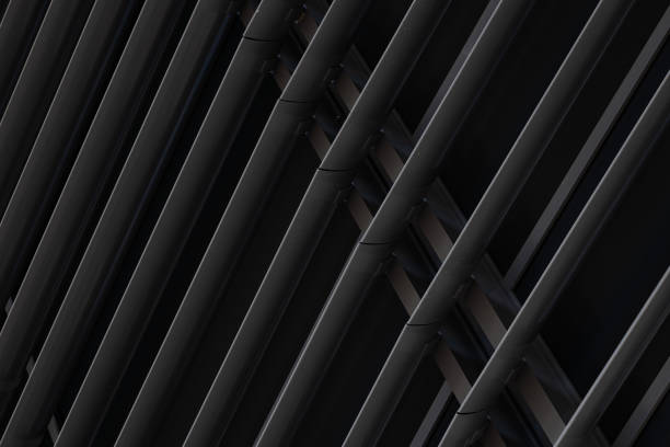 istock Angular view close-up of black metal beams structure in part of building 1177654663
