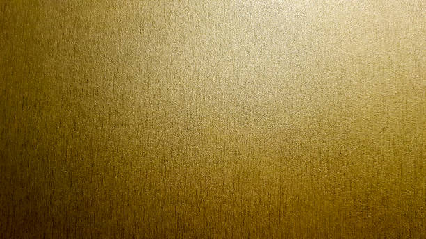 istock Gold background or texture and gradient shadow. wall and floor gold yellow mosaic tiles texture background. Metal texture background in gold.Panorama gold texture 1177655235