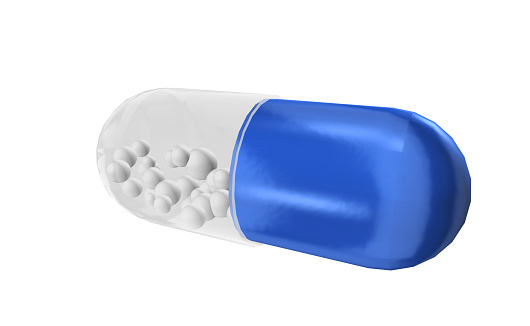 3D retard capsules on white background