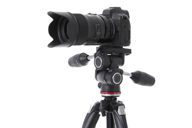 istock Side-view of professional camera device on tripod isolated 1177656328